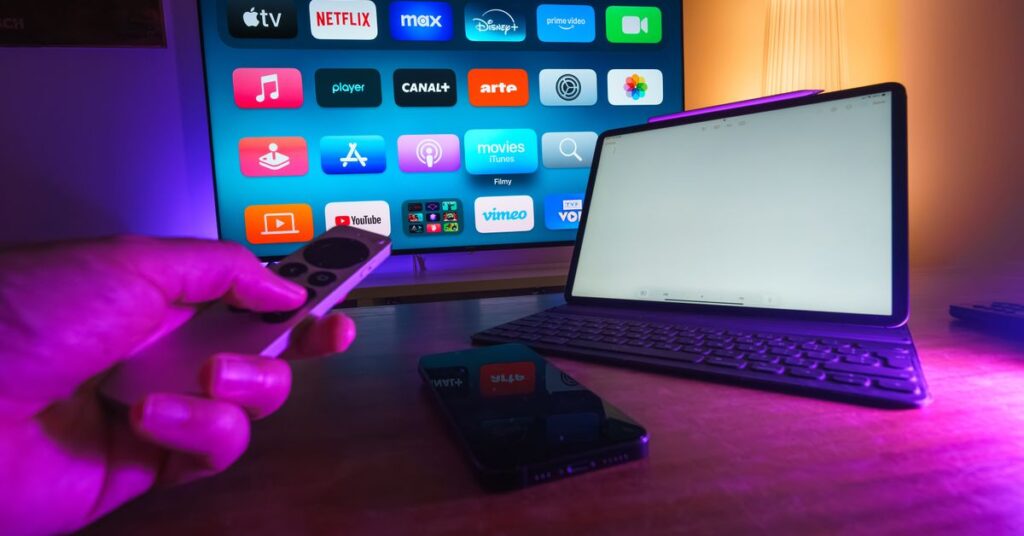 Family watching the best movies on Hotstar in Hindi on a smart TV
